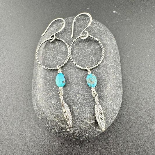 Elegant Royston Turquoise Sterling Silver Circle Earrings with Feather Accents