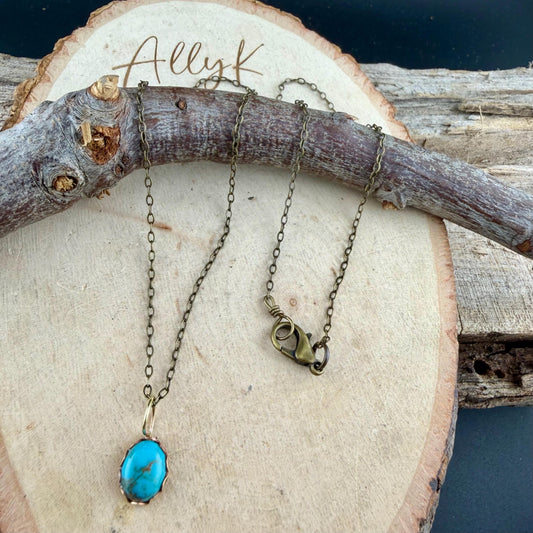 Kingman Turquoise Pendant Necklace • Antique Brass • 8×10 Turquoise Cabochon