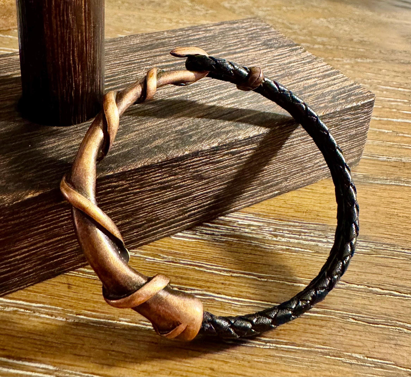 Braided leather bracelet with antique copper color wire wrap style cuff, brown or black leather option