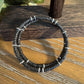 Carbon steel memory wire bracelet with black lava rock and silver alloy spacers / gemstone bracelet
