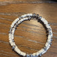 Carbon steel memory wire bracelet with howlite gemstone and silver alloy spacers / gemstone bracelet