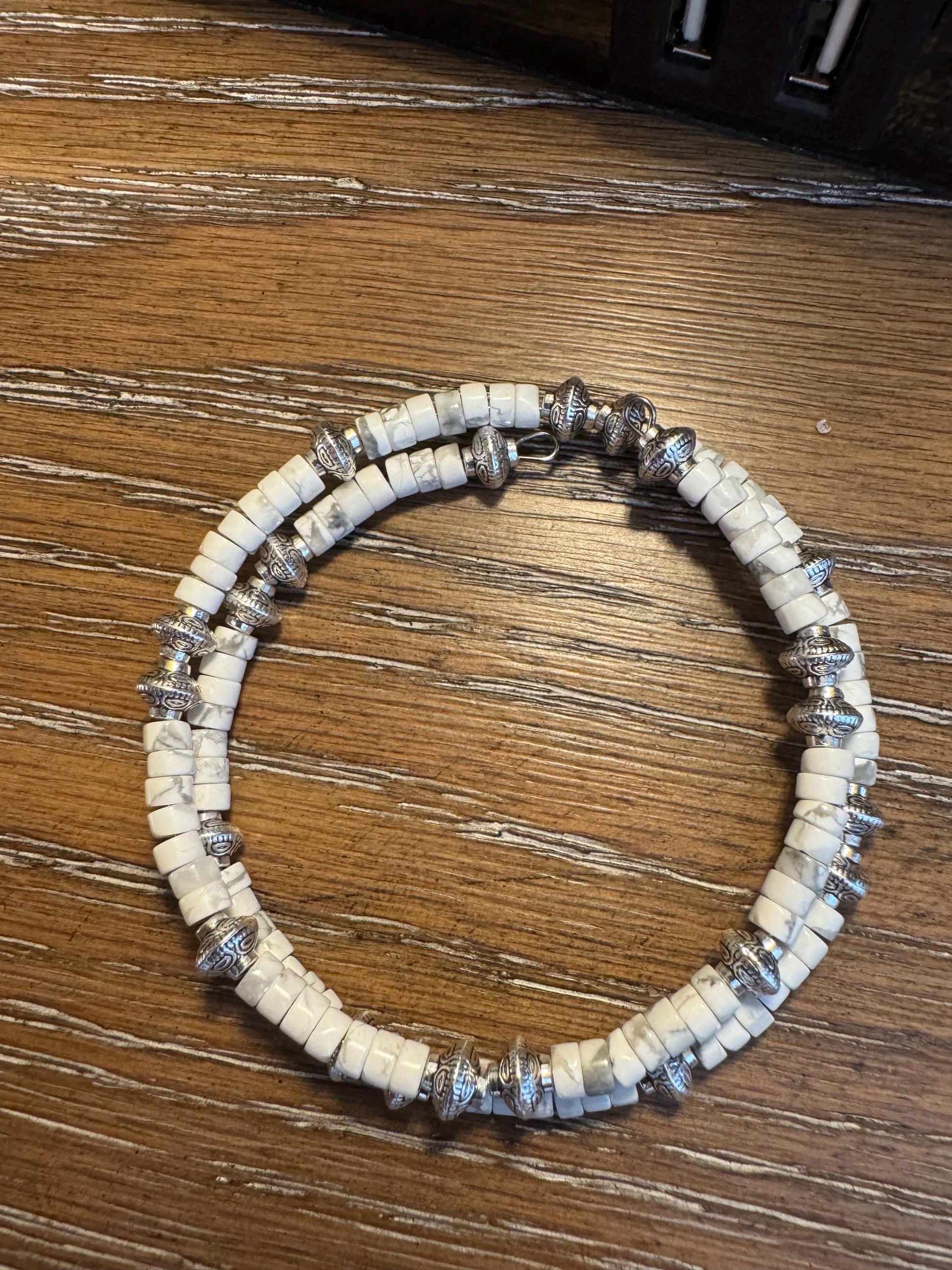 Carbon steel memory wire bracelet with howlite gemstone and silver alloy spacers / gemstone bracelet