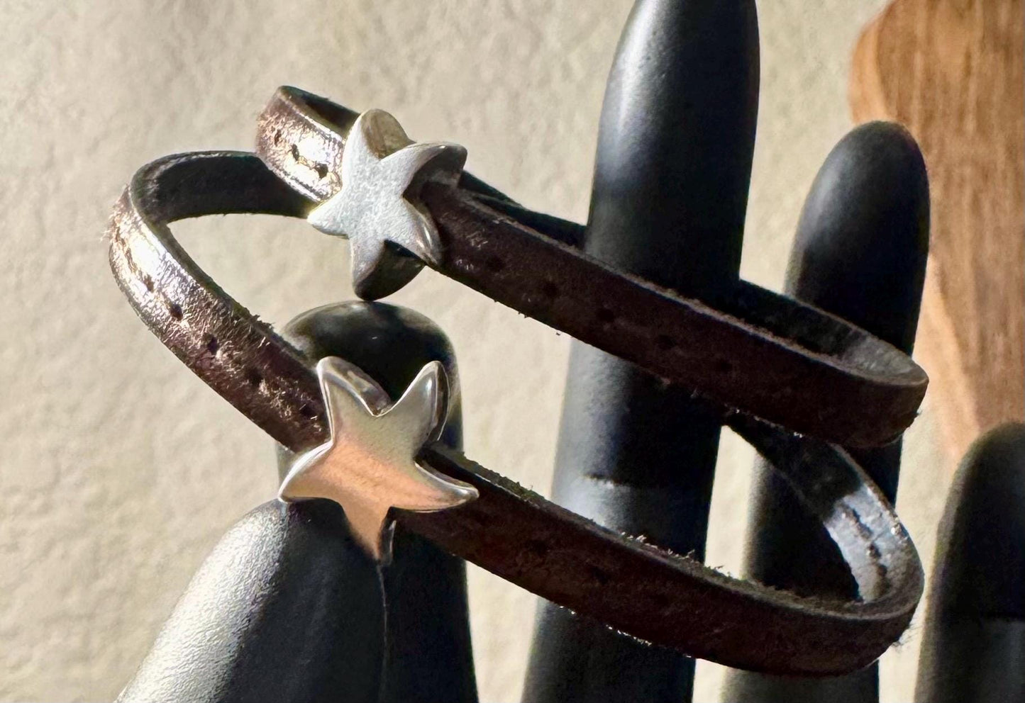 Leather wrap bracelet with silver star sliders and magnet closure