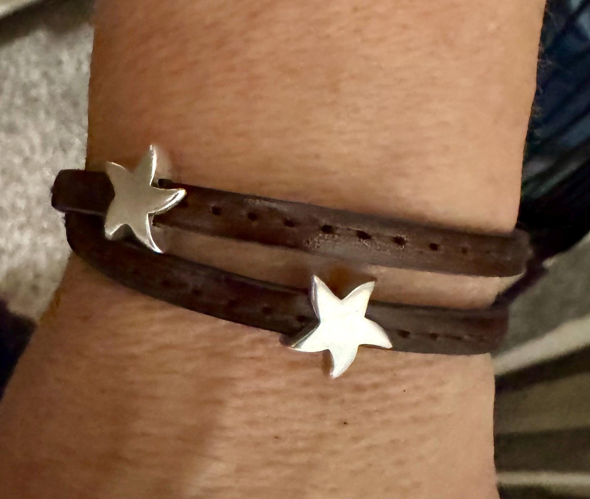 Leather wrap bracelet with silver star sliders and magnet closure