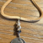 Indian Head Buffalo Nickel Necklace on Deerskin Lace with White Buffalo Gemstone