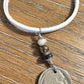 Indian head buffalo nickel on genuine deerskin single leather lace with white buffalo gemstone