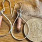 Black pink rhodonite gemstone with sterling silver teardrop style dangle