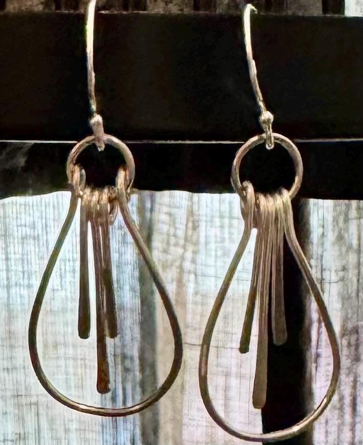 Paddle sterling silver teardrop style earrings