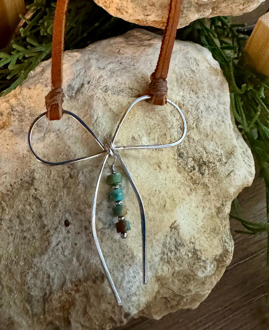 Sterling silver handmade bow on genuine deerskin single leather lace with turquoise dangle