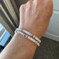 Carbon steel memory wire bracelet with howlite gemstone and silver alloy spacers / gemstone bracelet