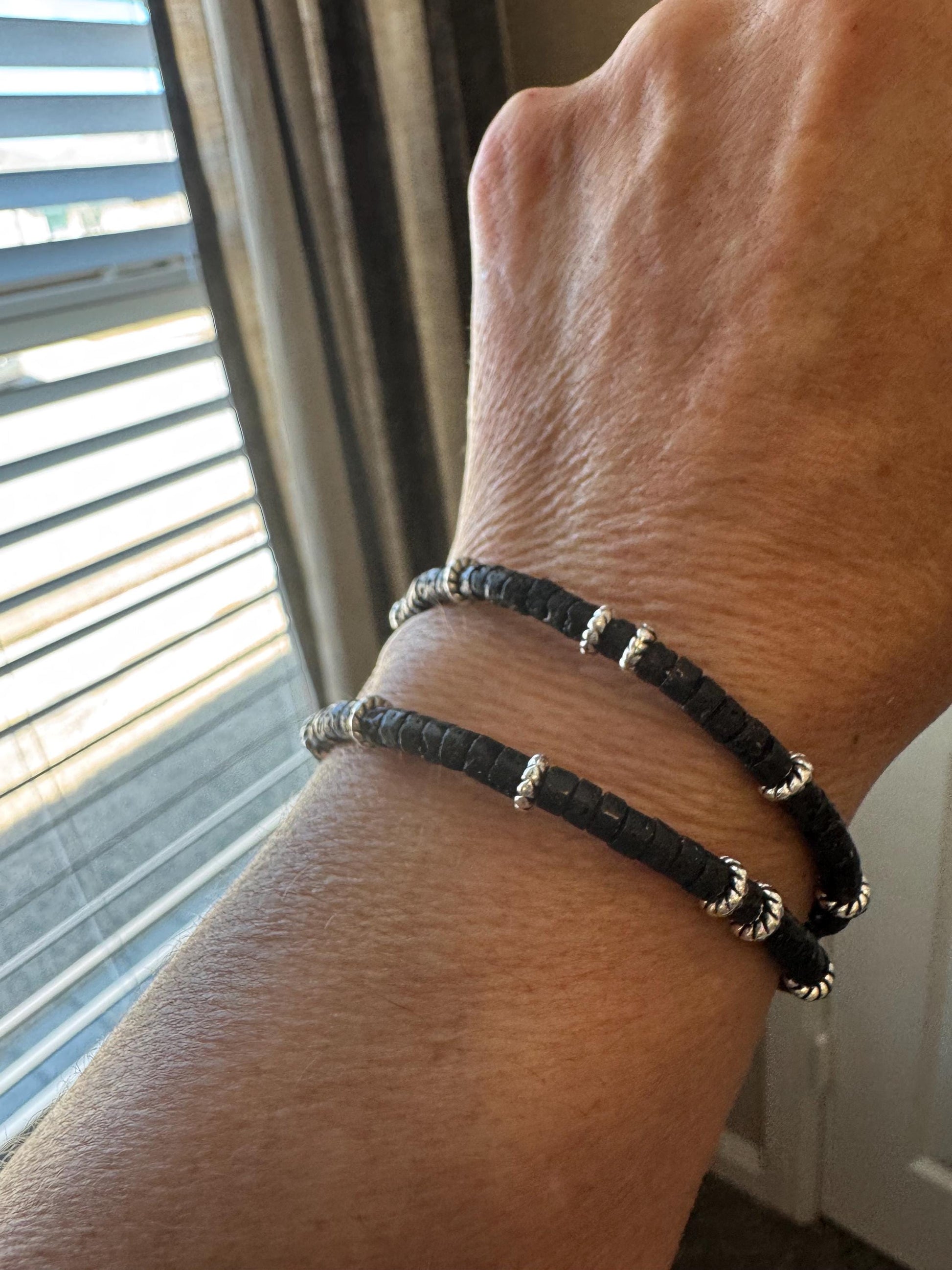Carbon steel memory wire bracelet with black lava rock and silver alloy spacers / gemstone bracelet