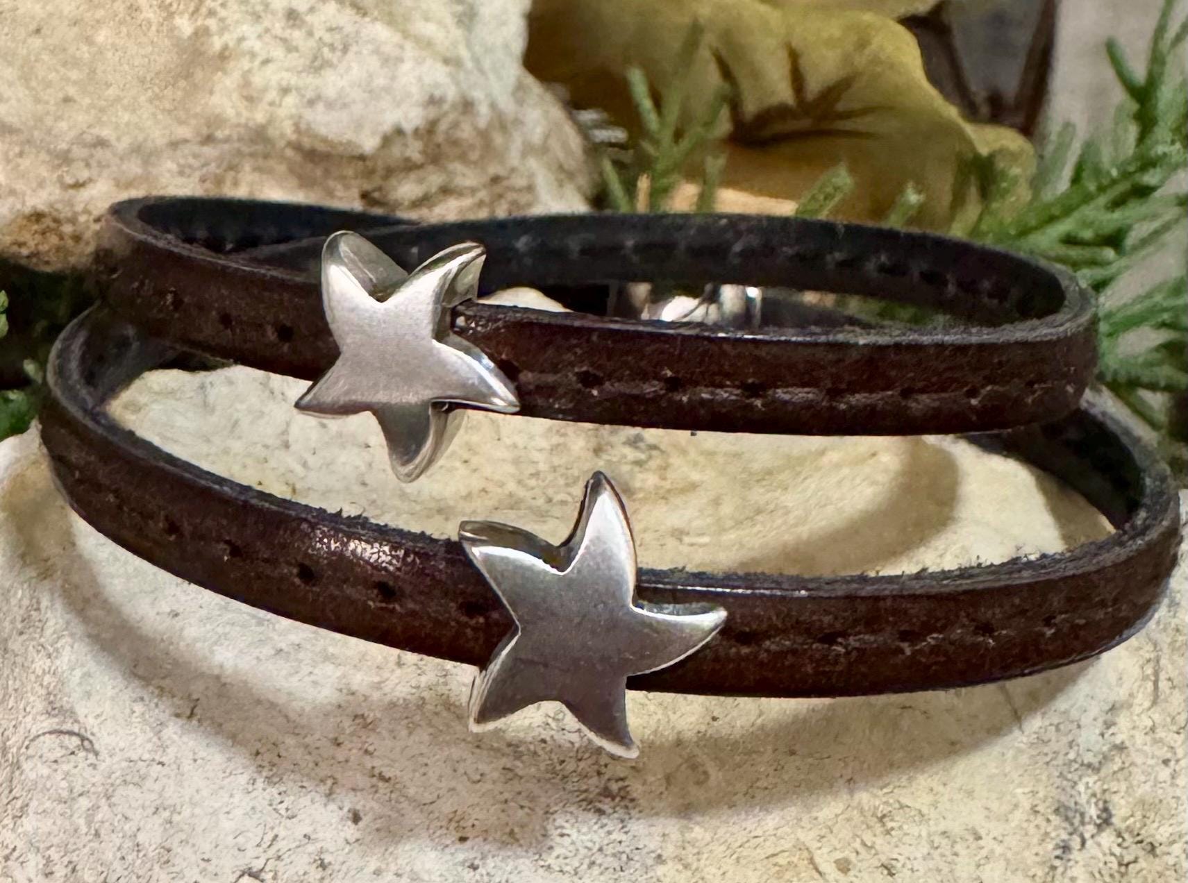 Leather wrap bracelet with silver star sliders and magnet closure