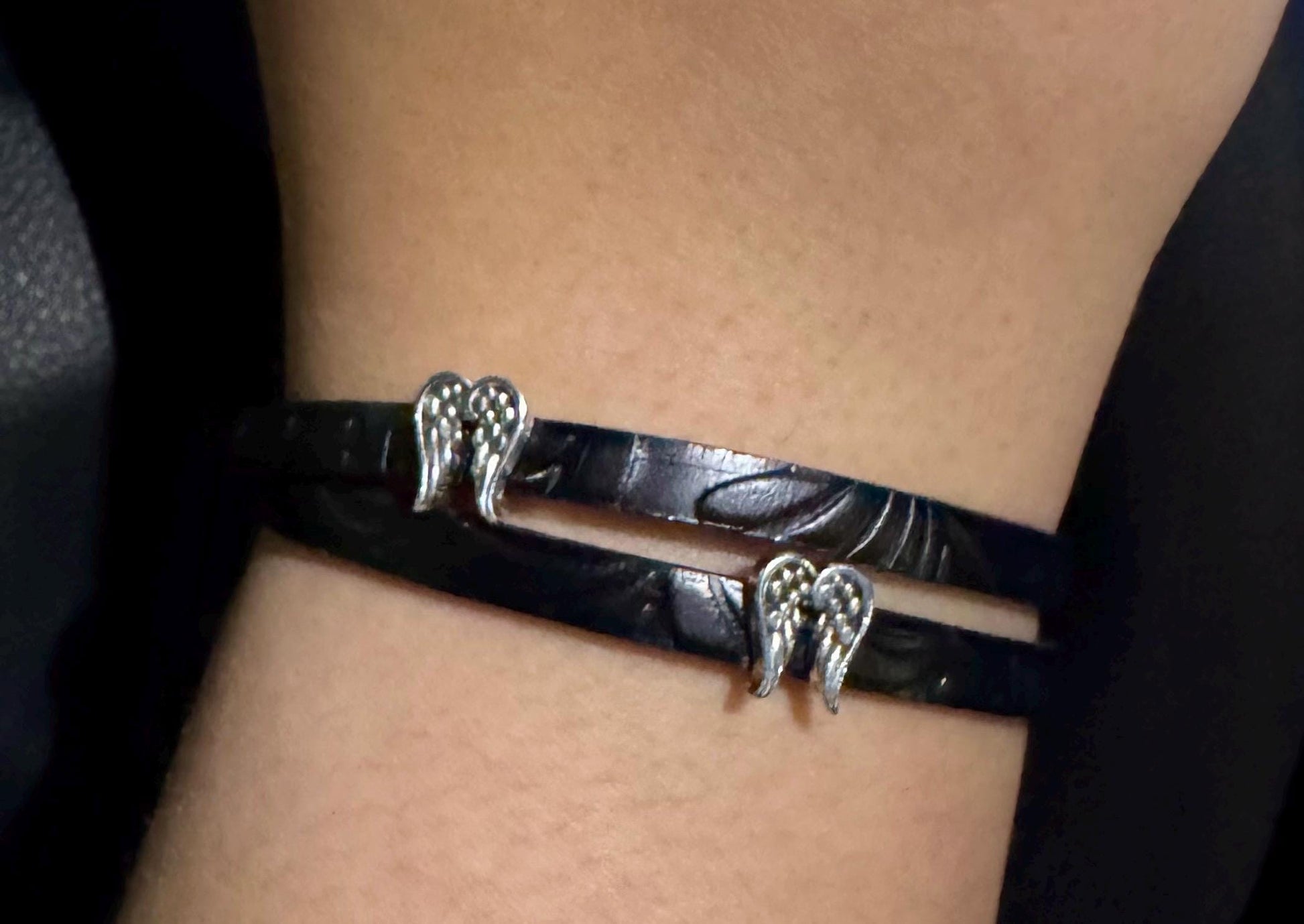 Embossed flower pattern leather wrap bracelet with angel wings spacers and magnet closure, black or dark brown leather