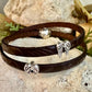 Embossed flower pattern leather wrap bracelet with angel wings spacers and magnet closure, black or dark brown leather