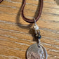 Indian head buffalo nickel on genuine deerskin single leather lace with white buffalo gemstone