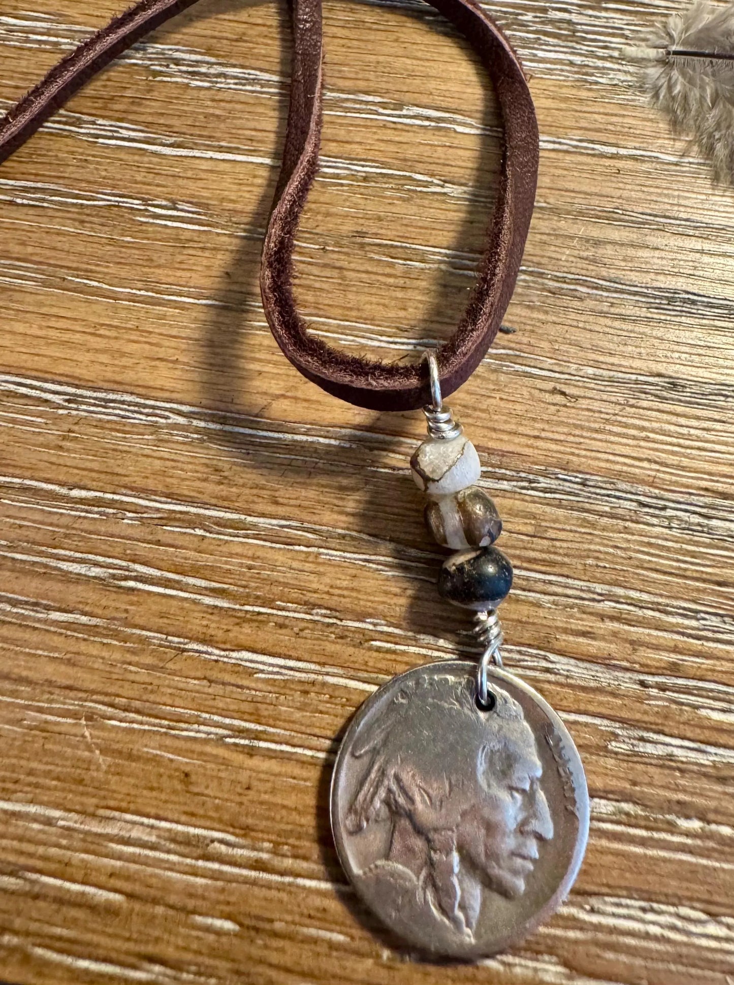 Indian Head Buffalo Nickel Necklace on Deerskin Lace with White Buffalo Gemstone