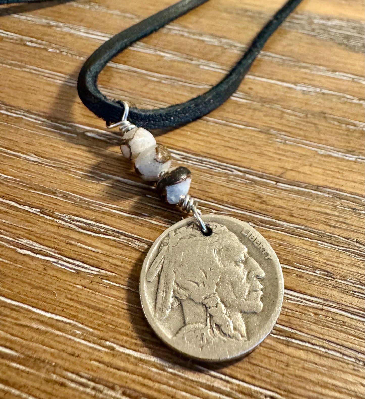 Indian head buffalo nickel on genuine deerskin single leather lace with white buffalo gemstone