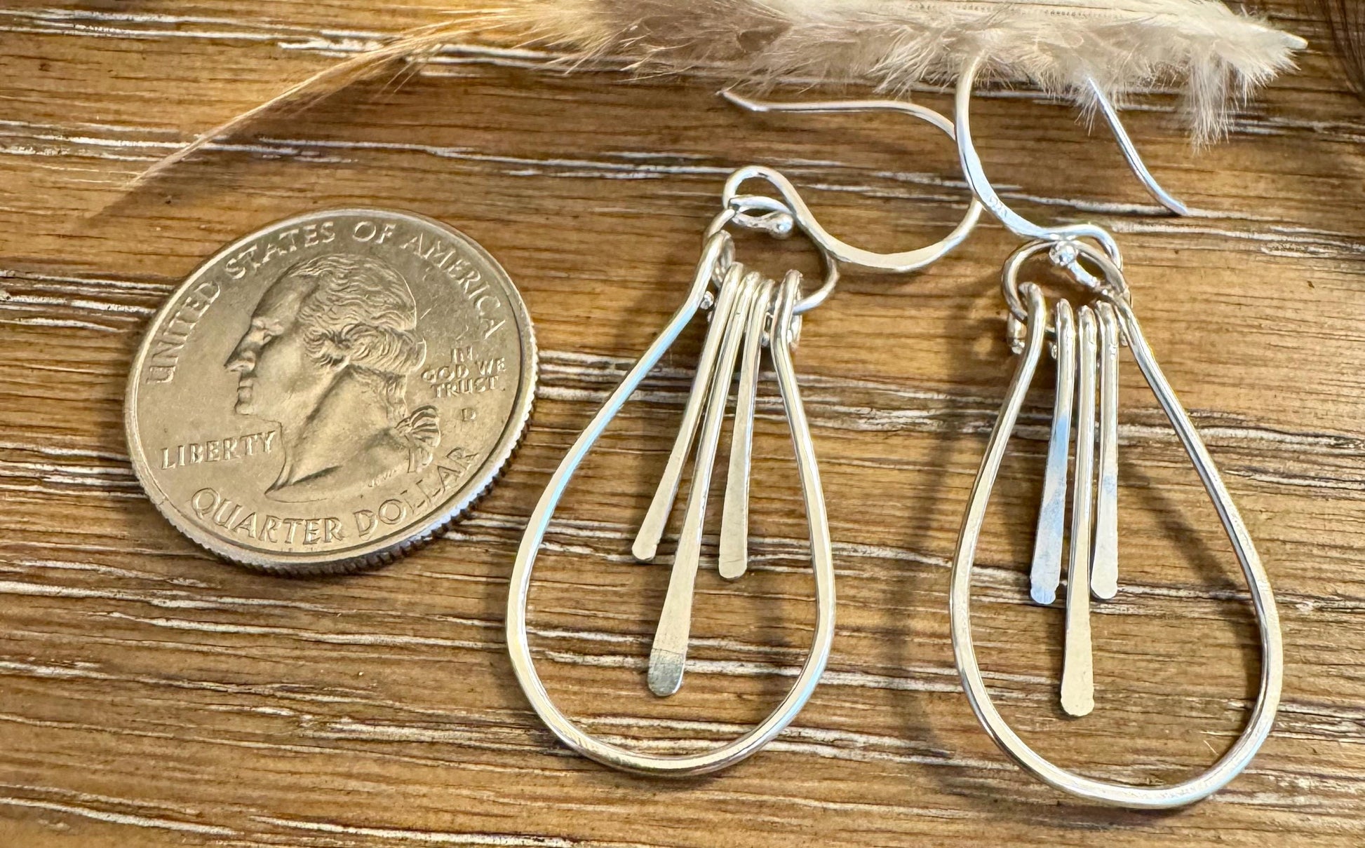 Paddle sterling silver teardrop style earrings