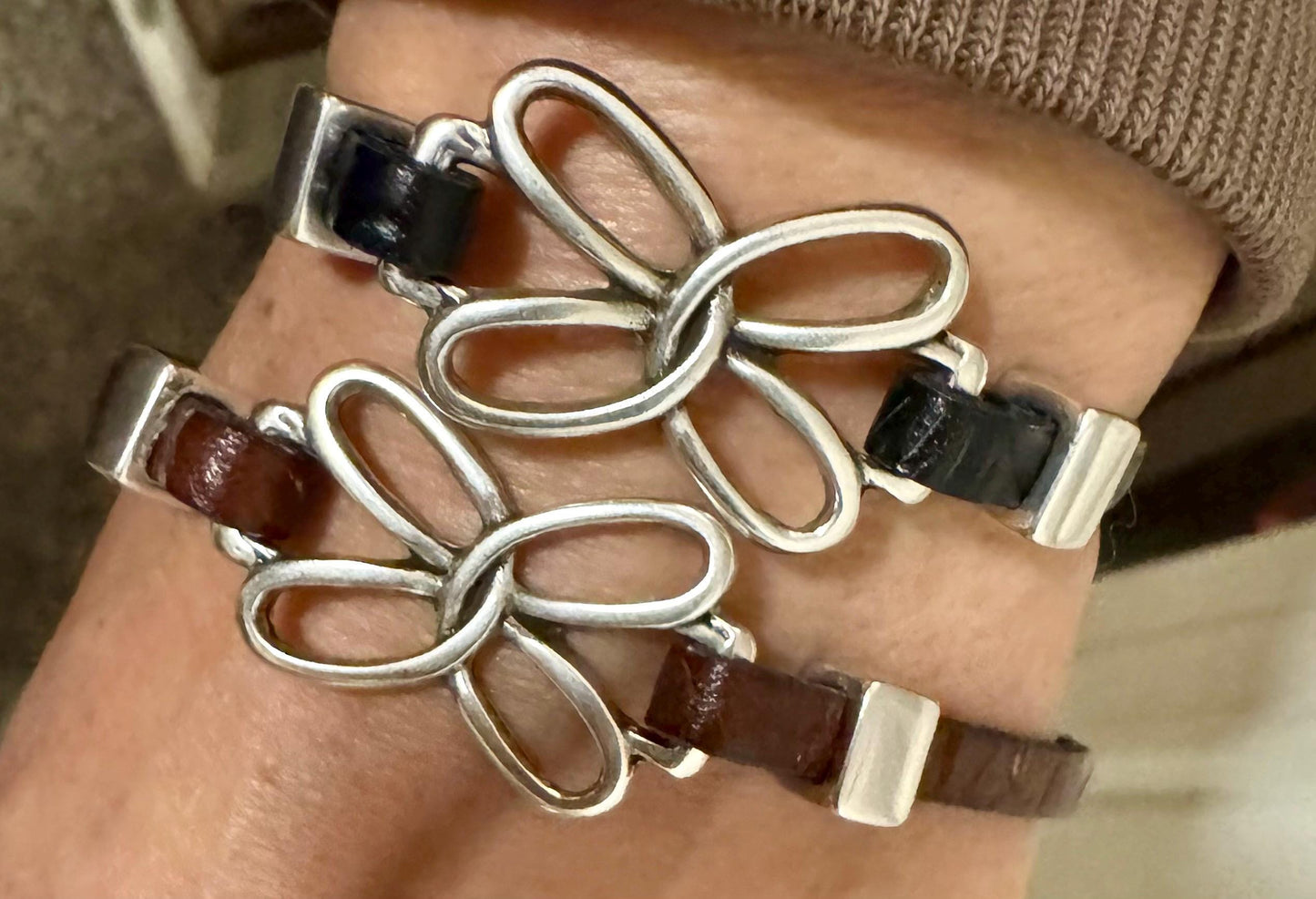 Embossed leather bracelet with stainless steel twisted butterfly connector, dark brown or black