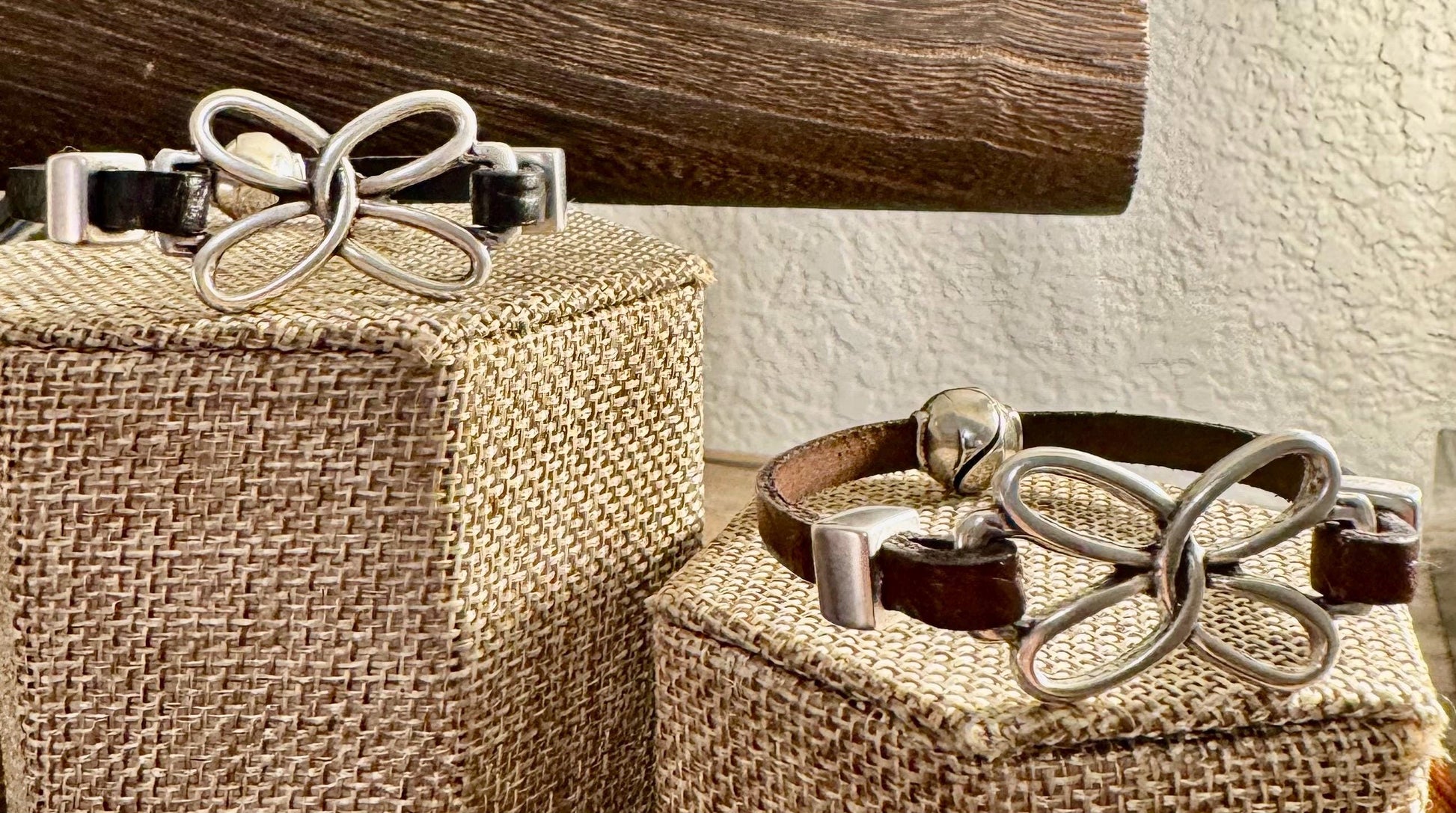 Embossed leather bracelet with stainless steel twisted butterfly connector, dark brown or black