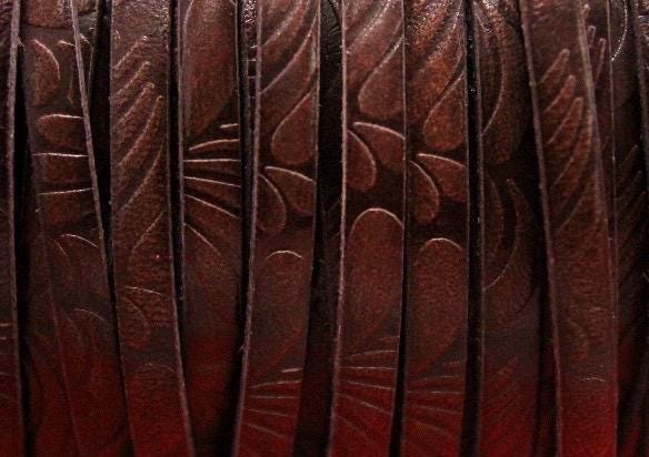 Embossed leather bracelet with stainless steel twisted butterfly connector, dark brown or black