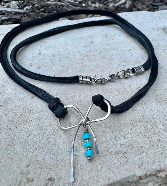 Dainty little silver handmade bow on genuine deerskin single leather lace with turquoise dangle