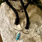 Dainty little silver handmade bow on genuine deerskin single leather lace with turquoise dangle