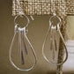 Paddle sterling silver teardrop style earrings