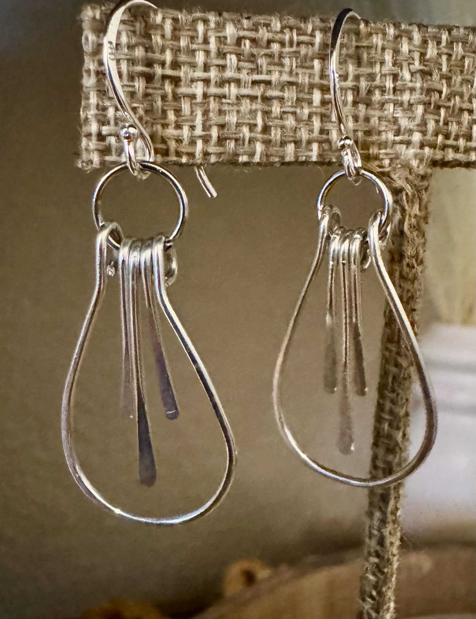 Paddle sterling silver teardrop style earrings