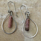 Black pink rhodonite gemstone with sterling silver teardrop style dangle