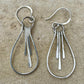 Paddle sterling silver teardrop style earrings