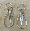 Paddle sterling silver teardrop style earrings