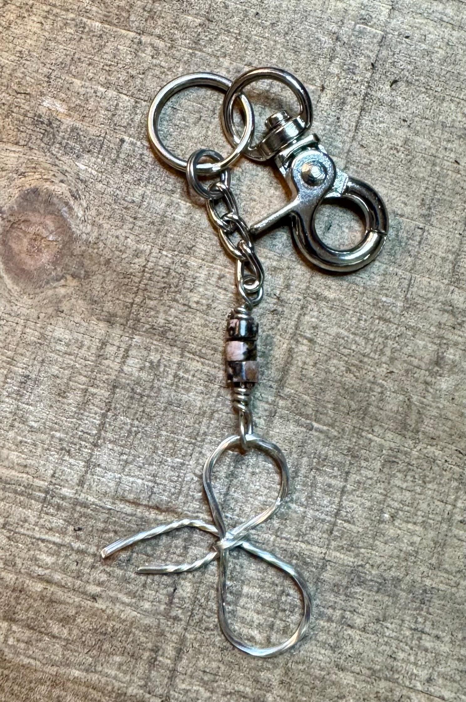 Keychain with black pink rhodonite gemstones and sterling silver bow
