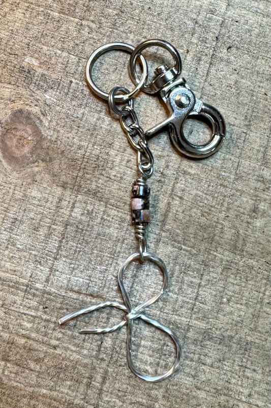 Keychain with black pink rhodonite gemstones and sterling silver bow