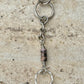 Keychain with black pink rhodonite gemstones and sterling silver bow