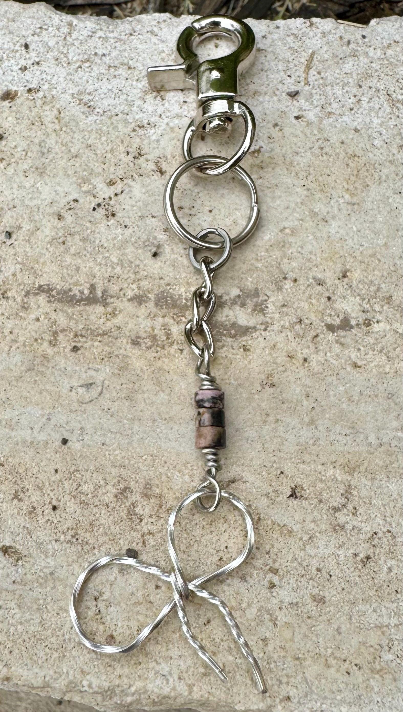 Keychain with black pink rhodonite gemstones and sterling silver bow
