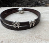 Embossed flower pattern leather wrap bracelet with angel wings spacers and magnet closure, black or dark brown leather