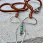 Sterling silver handmade bow on genuine deerskin single leather lace with turquoise dangle