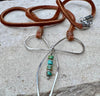 Sterling silver handmade bow on genuine deerskin single leather lace with turquoise dangle