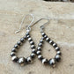 Navajo pearl hoop teardrop style, sterling silver earrings