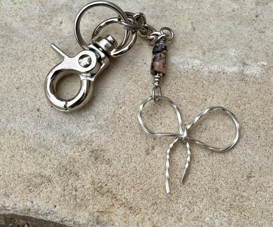 Keychain with black pink rhodonite gemstones and sterling silver bow