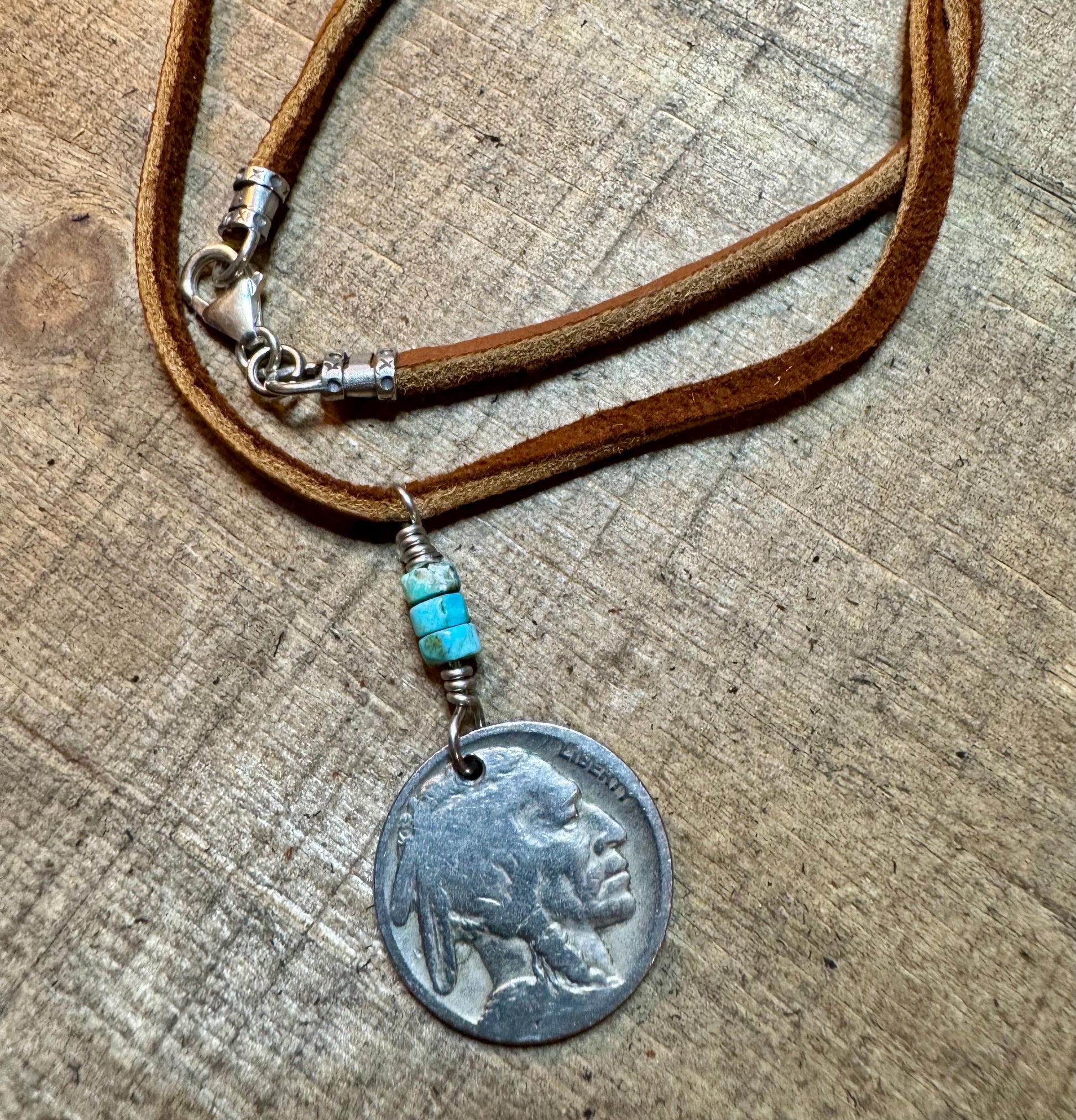 Indian head buffalo nickel on genuine deerskin single leather lace with turquoise gemstone