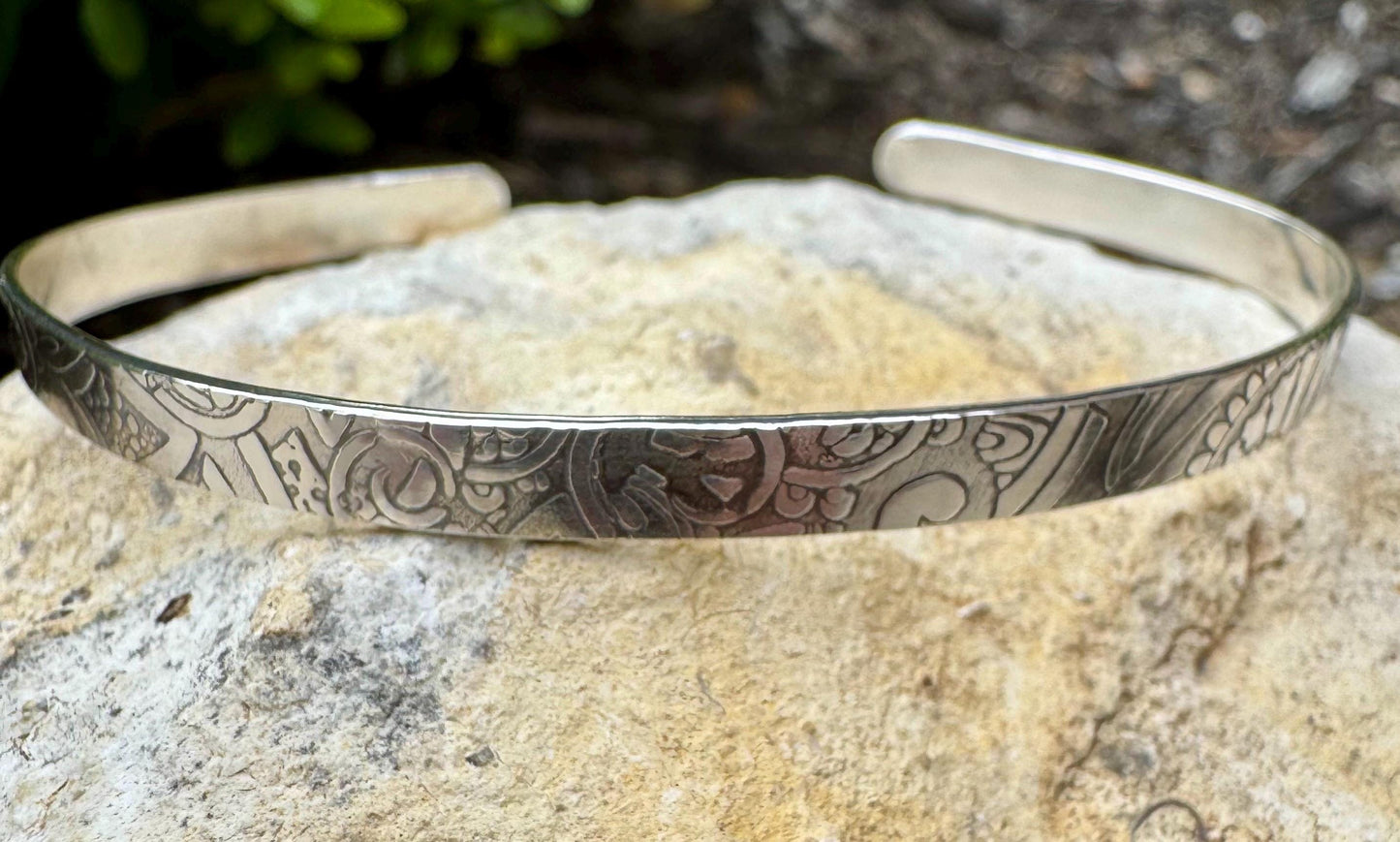Flower doodle imprinted sterling silver cuff bracelet