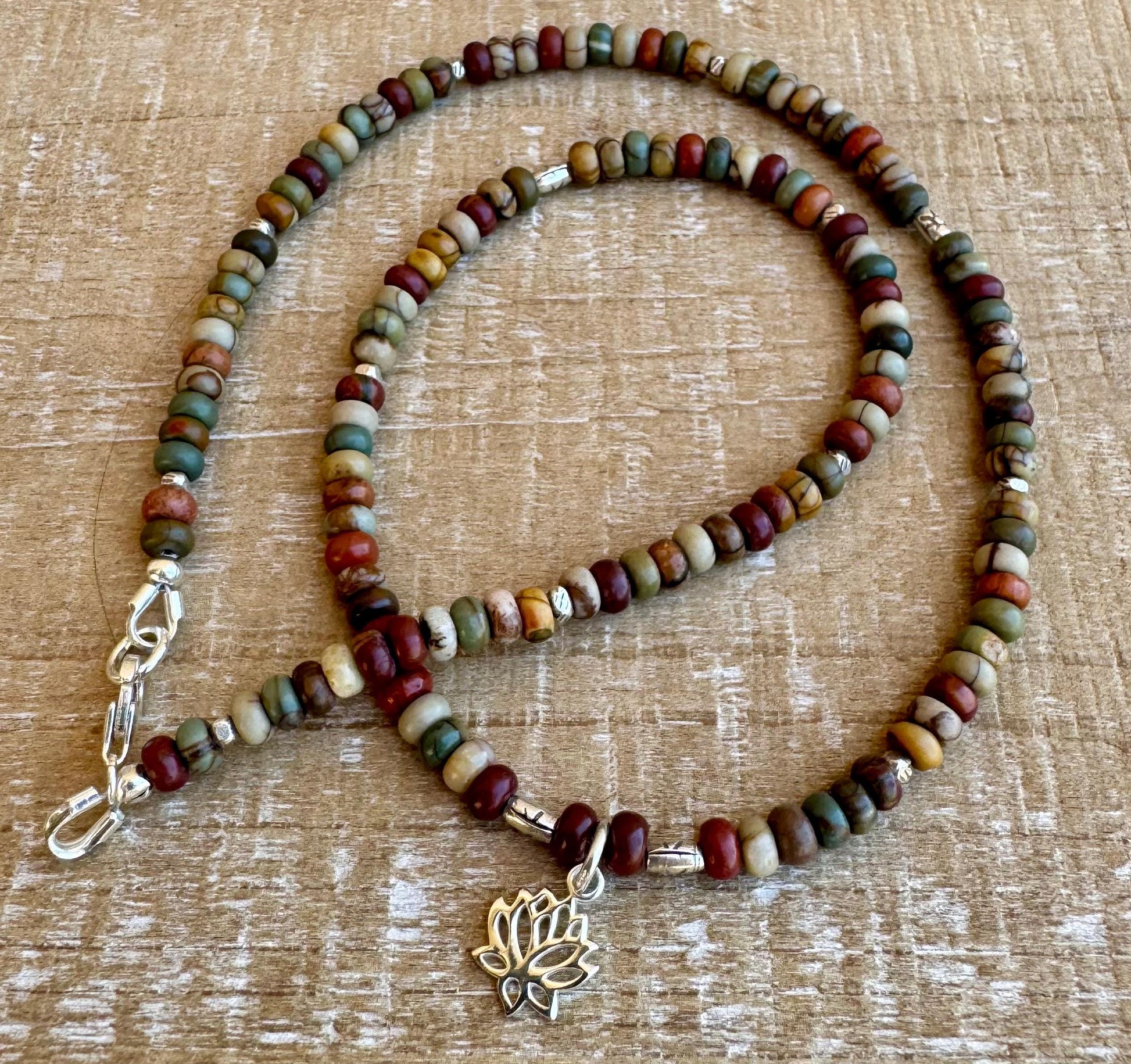 Picasso Red Creek Jasper gemstone necklace with sterling silver spacers and lotus flower pendant