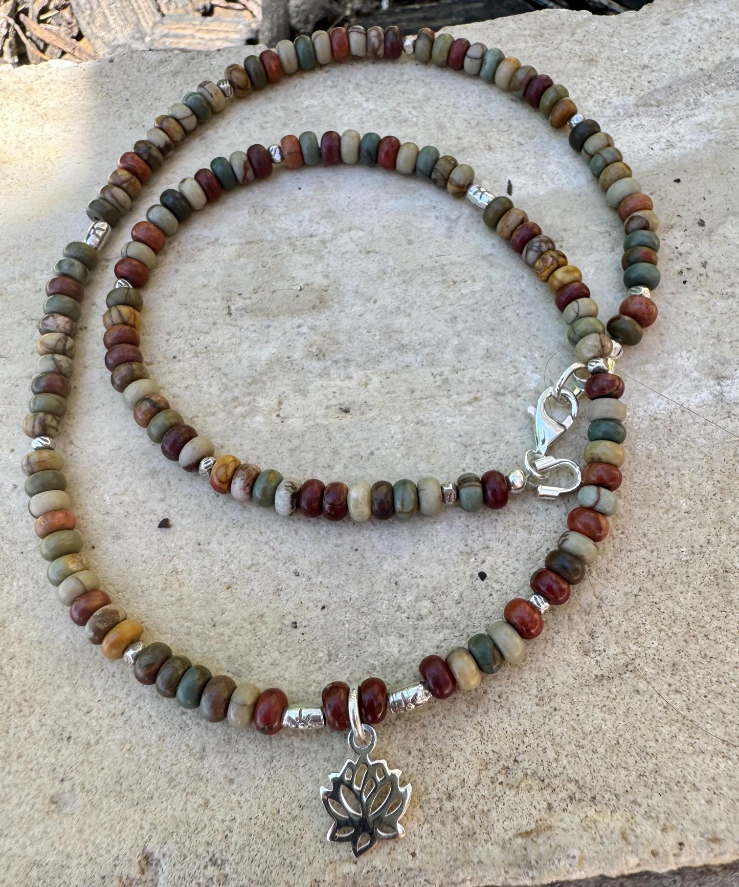 Picasso Red Creek Jasper gemstone necklace with sterling silver spacers and lotus flower pendant