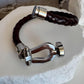 Leather bracelet with stainless steel horseshoe shackle