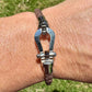 Leather bracelet with stainless steel horseshoe shackle