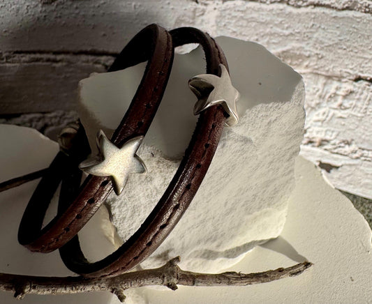 Leather wrap bracelet with silver star sliders and magnet closure