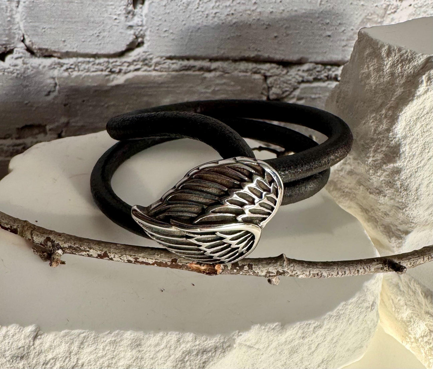 Leather bracelet wrap with angel wing clasp