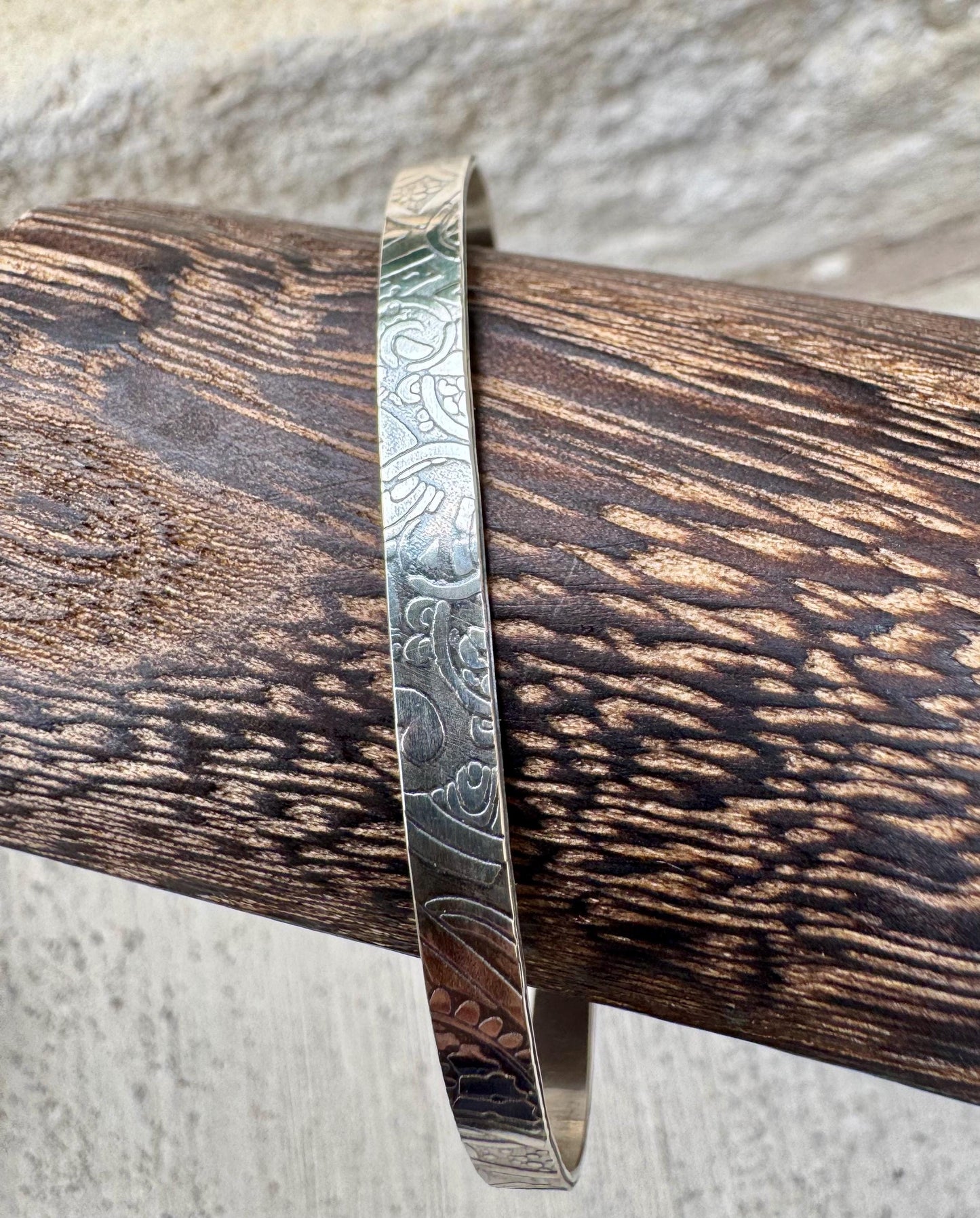 Flower doodle imprinted sterling silver cuff bracelet